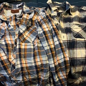 Two (2) men plaid flannel shirts